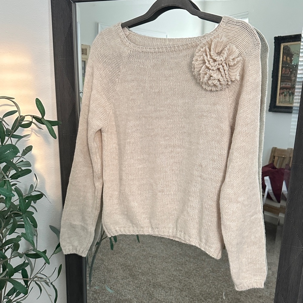 Elegant Cream Sweater with Floral Accent